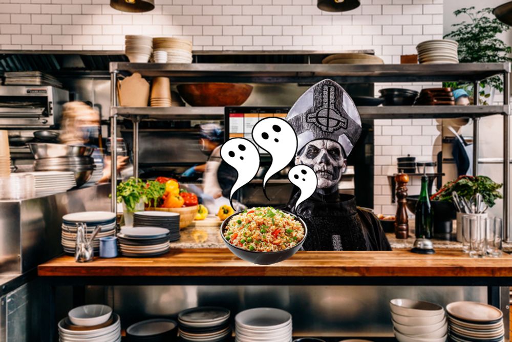 The front man for Ghost in a commercial kitchen serving fried rice with cartoon ghosts coming out of it