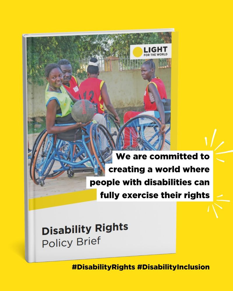 The image shows a book with a picture of a group of people playing basketball in wheelchairs. The book is Light for the World's Disability Rights Policy Brief. It reads: "we are committed to creating a world where people with disabilities can fully exercise their rights."
