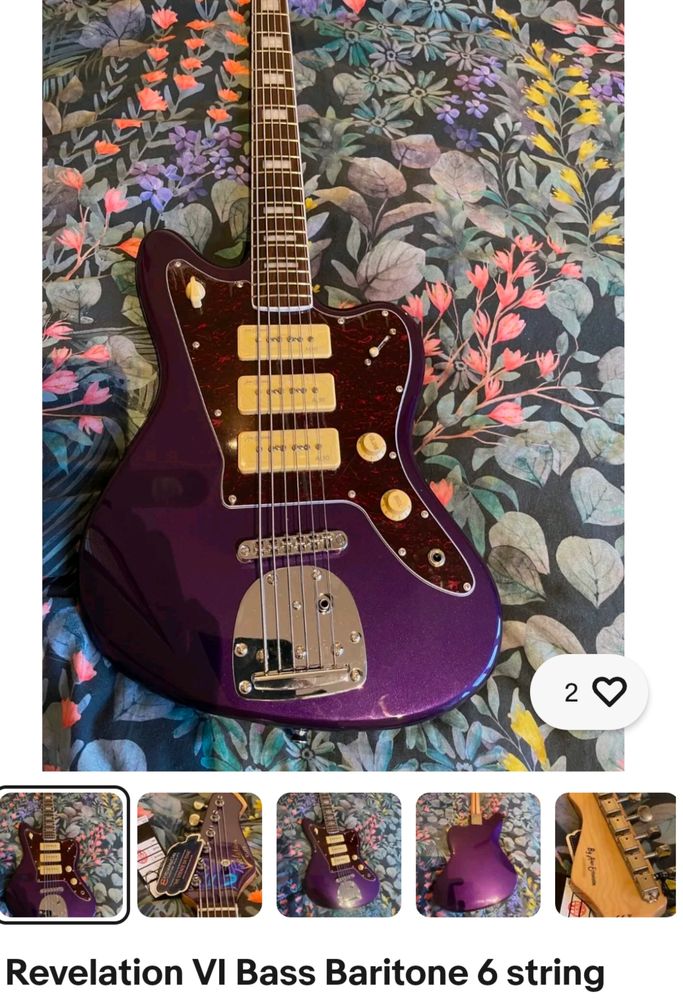 Screenshot of an eBay listing for a mint condition Revelation VI Bass Baritone 6 string, in metallic purple. 