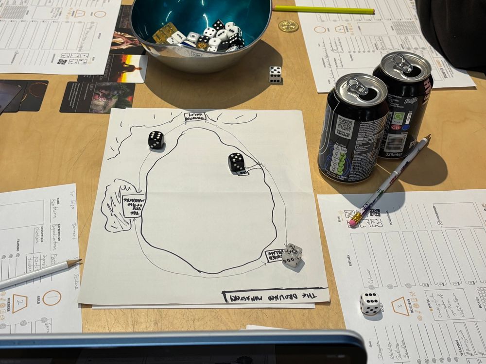 The Drowned Monastery’s set map, crudely drawn by me and with a Trophy dice as a marker for their location. The weak spots are in white: 5 and 6, as Ser Gipp dived blindly into a fight and Sergio wasn’t prepared for multiple combatants.
The dark dice are a 5 and 6, defeating the wet ghosts but at a cost of 1 Ruin for each of them.