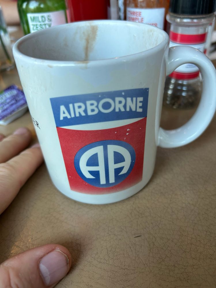 Faded and well loved 82nd Airborne coffee mug. 