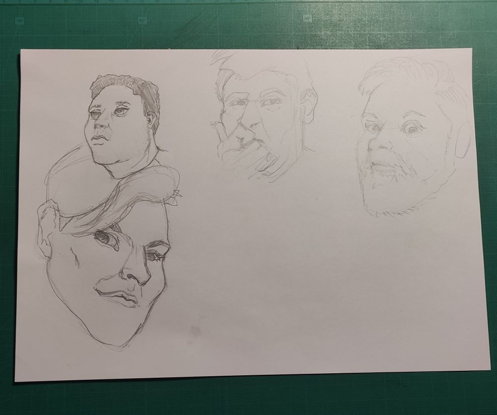 Sketch of 4 faces. The left one are from imagination the right are from reference, pause on video from Loading Ready Run.