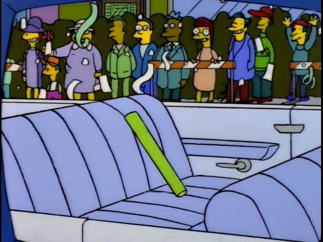 The inanimate carbon rod from the "Deep Space Homer" episode of the Simpsons. The rod is being given a tickertape parade in an open-top car, having helped Homer and the other astronauts return to Earth safely