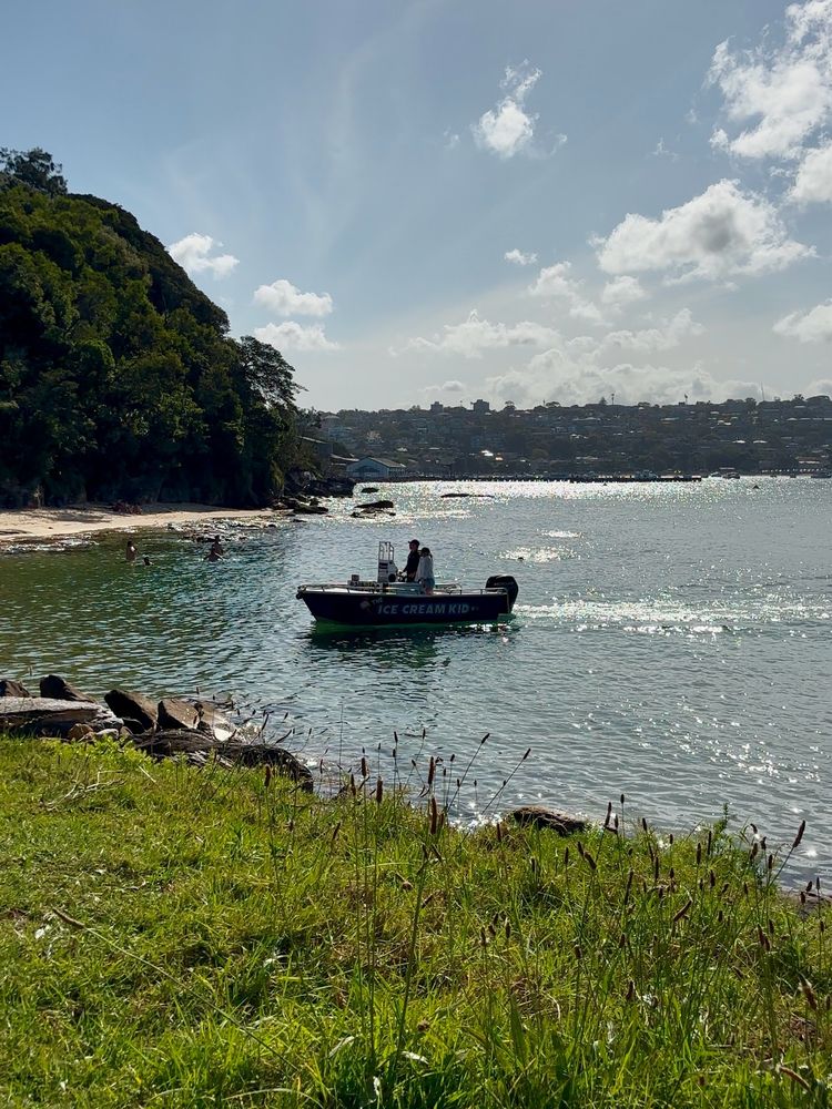 The ice cream boat arriving at a popular nude beach in Sydney.