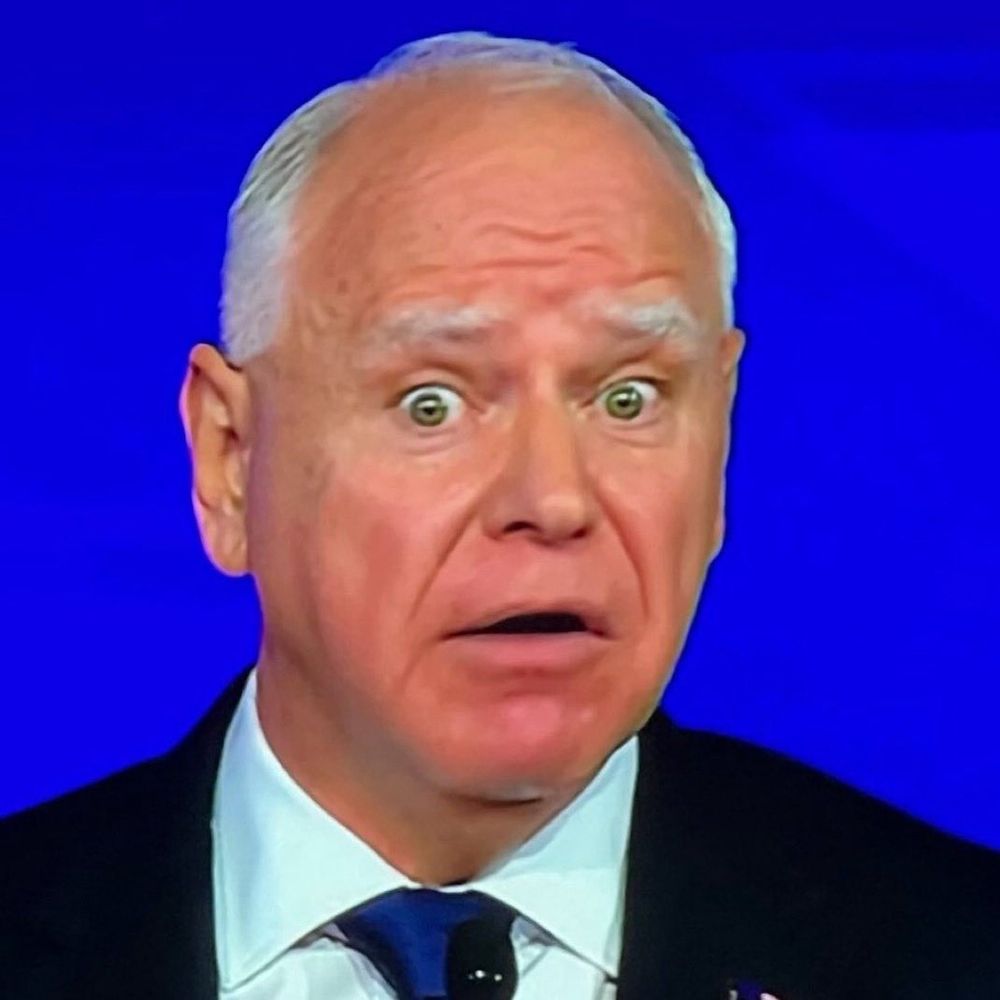 a picture of Tim Walz looking shocked and displeased