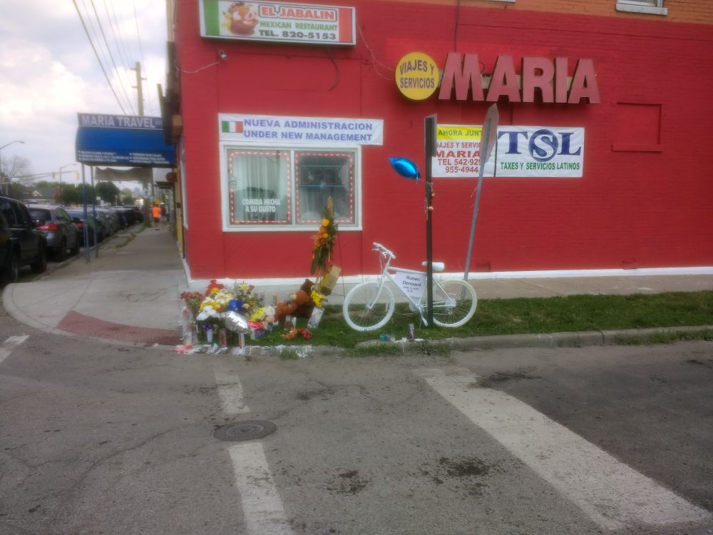 A picture of a memorial on a street corner on West Washington street in Indianapolis where Ruben Denizard was hit and killed on June 13, 2018 while sitting on a bicycle.