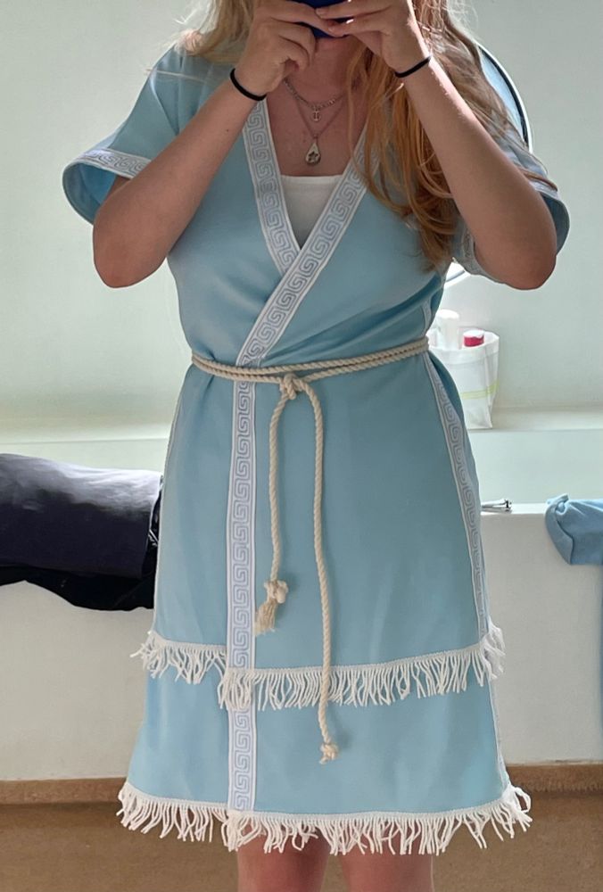 Cropped mirror selfie of me in my new light blue Mycenaean inspired tunic from the front
