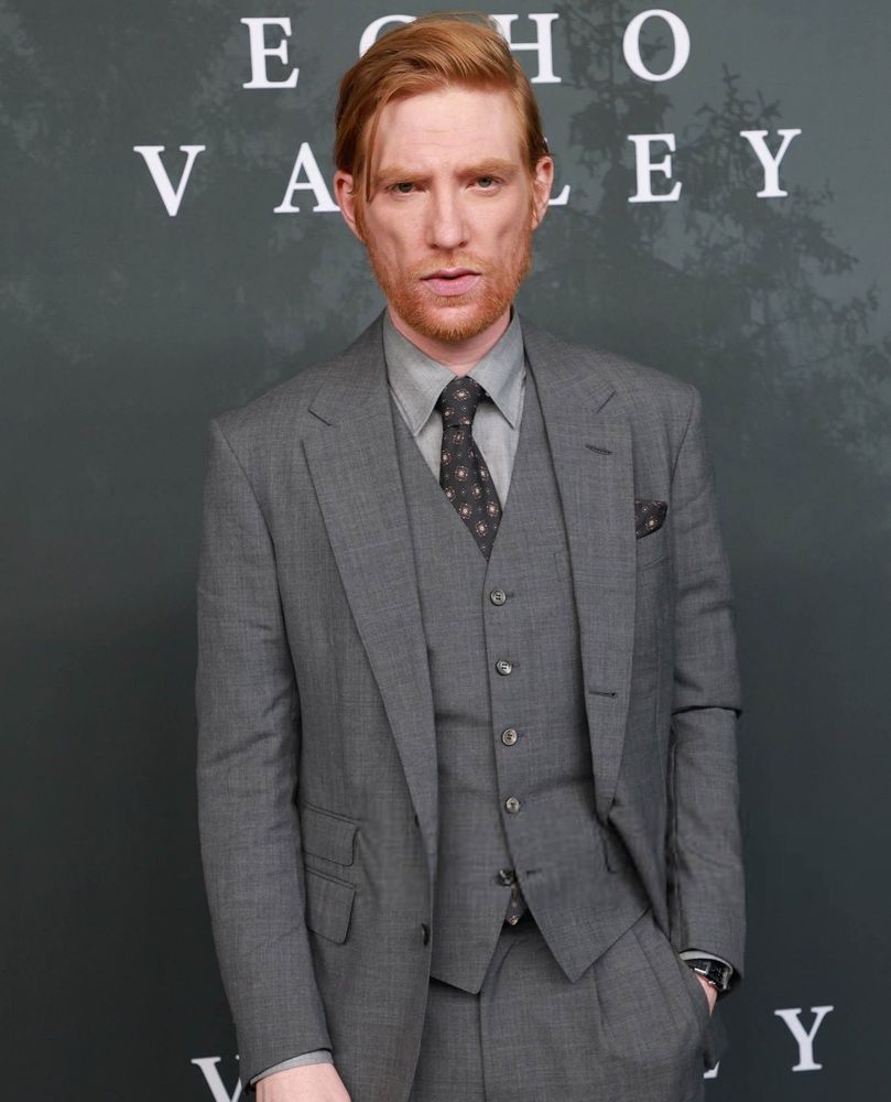 Domhnall Gleeson looking FINE AF in a grey three-piece suit at the Echo Valley premiere