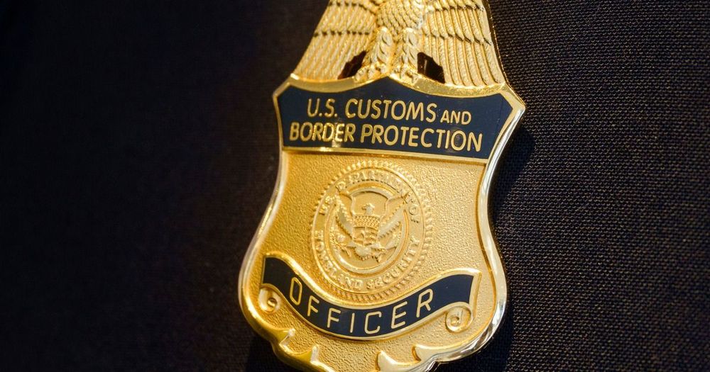A man is charged after throwing a sub-style sandwich at a U.S. Customs and Border Protection agent after allegedly calling him a "fascist" and shouting that he didn't want the agents patrolling Washington, D.C.