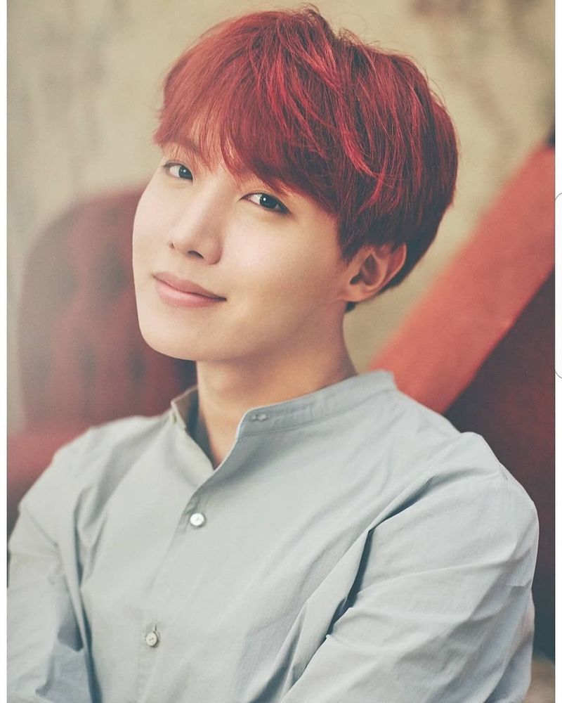 Redhead Hobi in a grey shirt looking stunning.