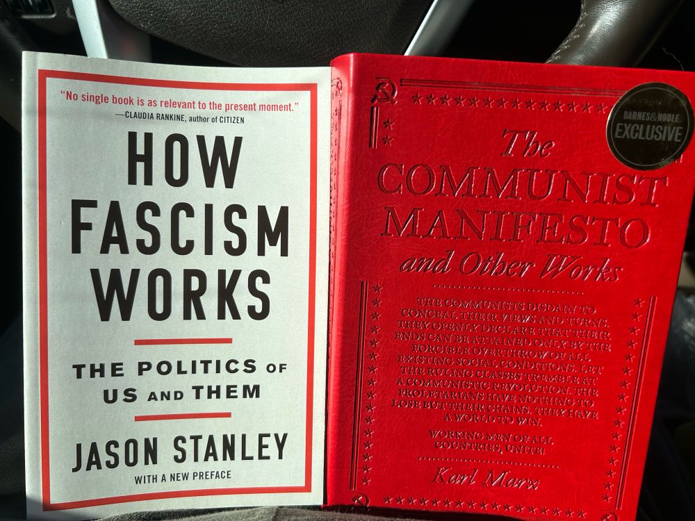 Two books side by side. How Facism Works by Jason Stanley and The Communist Manifesto and Other Works by Karl Marx.  
