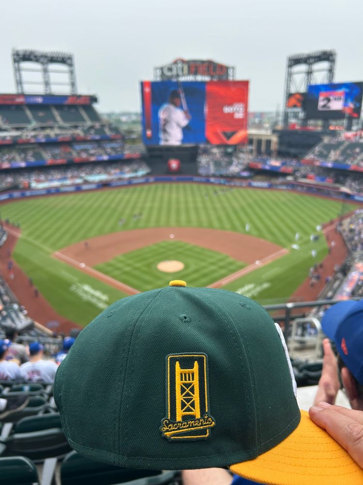 A stupid A’s hat at a Mets game.