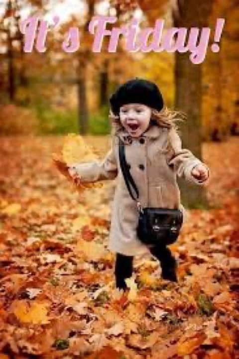 Young girl excitedly running through the leaves