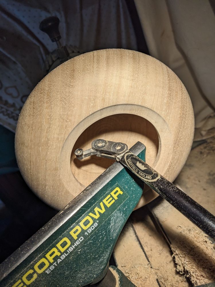 Crown hollowing tool and the wooden bowl, which I am working on right now.