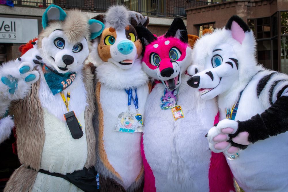 4 Fursuits all posed for a photo!