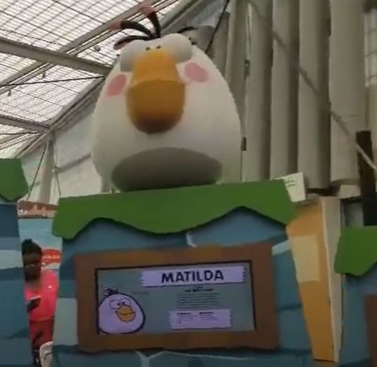 An image of "Angry Birds Universe: The Art and Science Behind a Global Phenomenon" from when it toured in The New York Hall Of Science back in October 2016, featuring Classic-style artwork of Matilda's MK3 design.