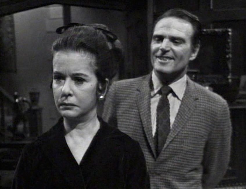 Elizabeth Stoddard (Joan Bennett), head of the Collins family, and Jason McGuire (Dennis Patrick), a conman, in the late 1960s/early 70s gothic daytime soap, Dark Shadows
