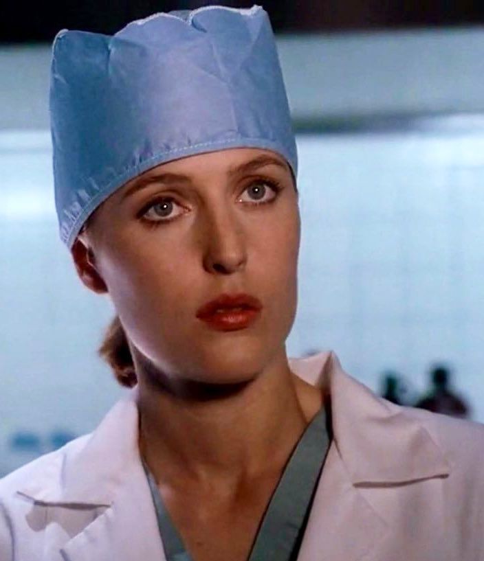 Gillian Anderson as Scully