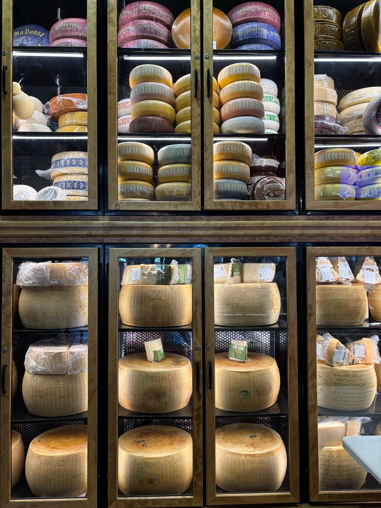 Wall full of cheese wheels 