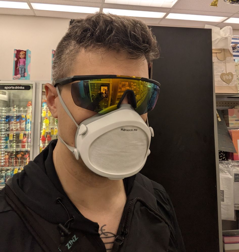me in drugstore wearing a flo mask but more importantly shiny wide sunglasses that can't be seen through like people who post right wing junk online.