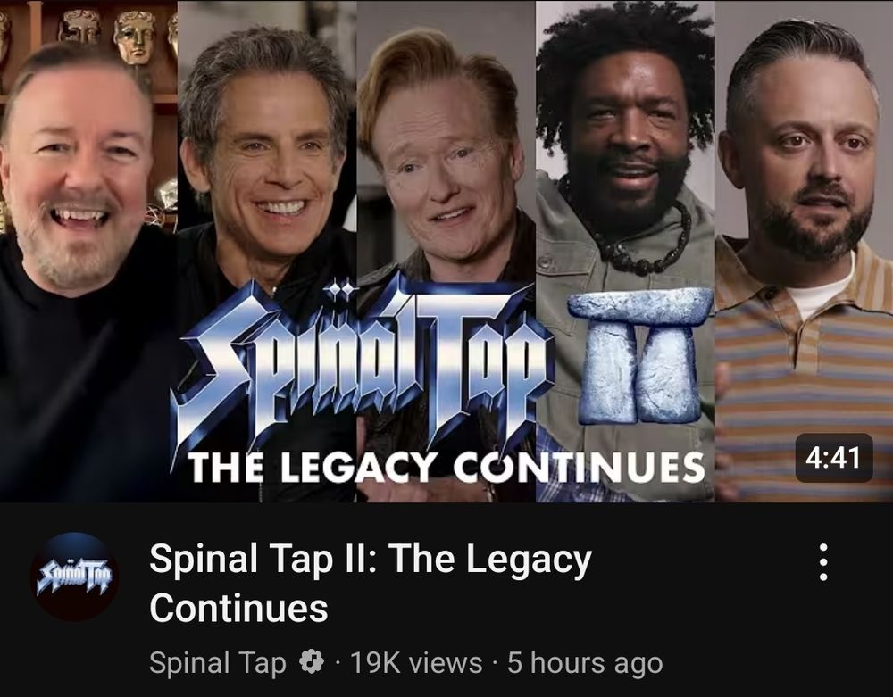 Spinal Tap II: The Legacy Continues, featuring a picture of five people: Ricky Gervais, Ben Stiller, Conan O'Brien, Questlove and some guy I don't know.
