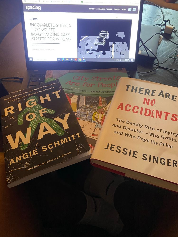 A few books taking space on my laptop

Right of Wa, City Streets Are For People and There AreNo Accidents

On the computer screen “Incomplete Streets, Incomplete Imaginations: Safe Streets for Whom?