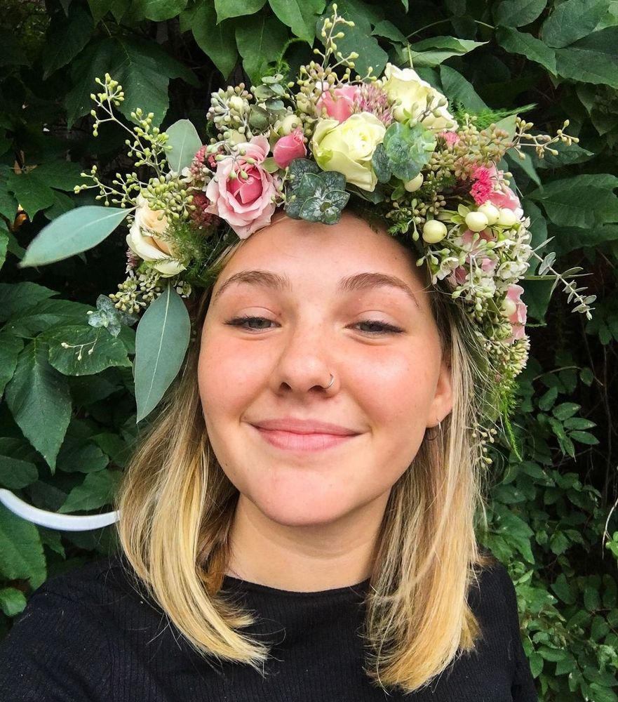 Image of Alex Amaro with a flower crown