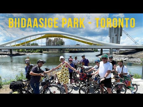 Image of people on bikes in front of a yello and white bridge

Biisaasige Park - Toronto