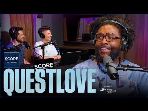 Image of three people behind microphones Score and Questlove