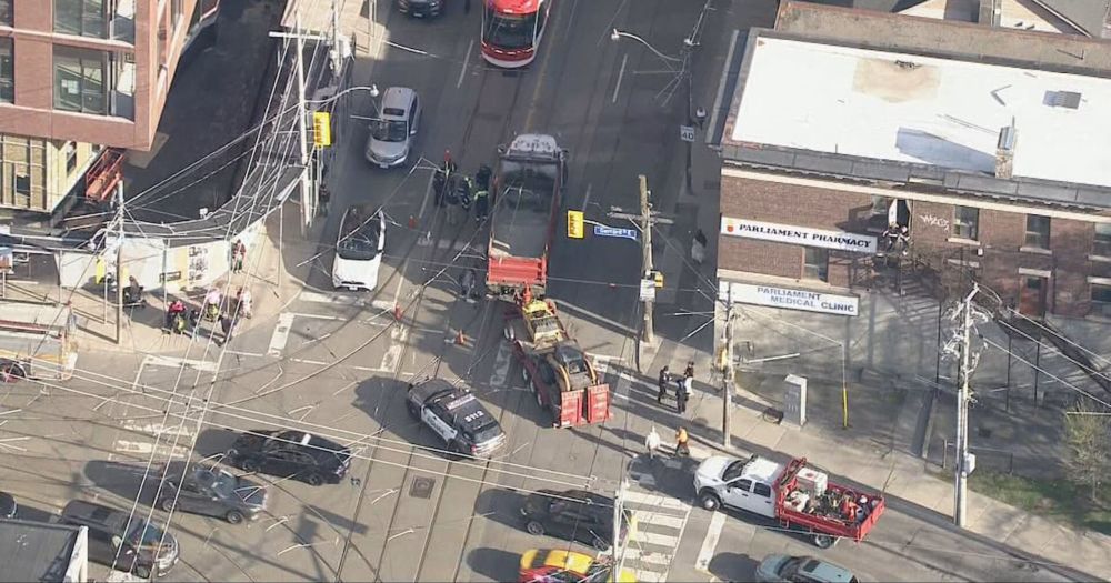 Woman struck by truck while cycling taken to hospital with serious injuries