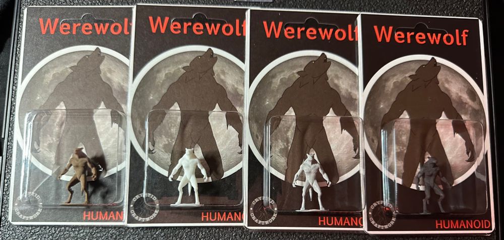 Custom carded mini werewolf figures; Brown, White, Grey and Black