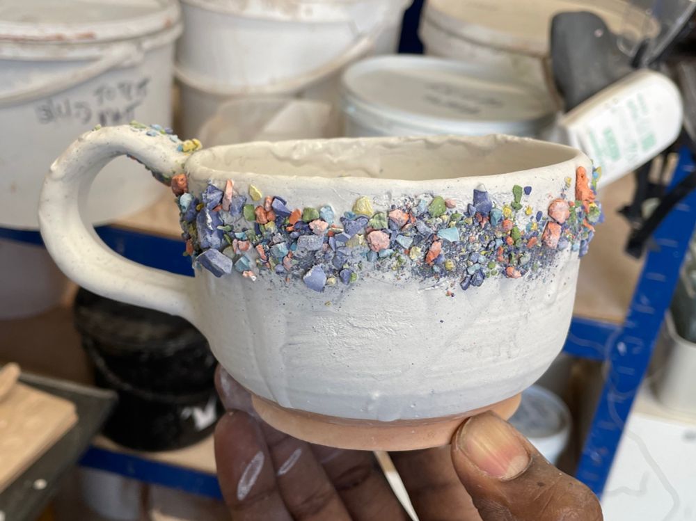 stoneware mug with multicoloured confetti style glazing (before firing)