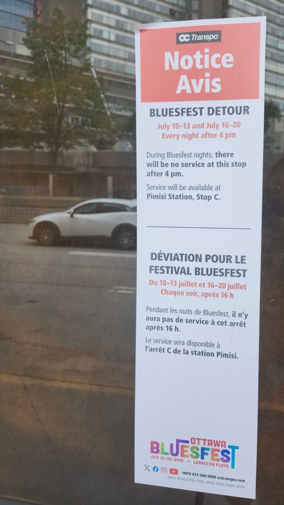 Poster at the bus stop showing a detour