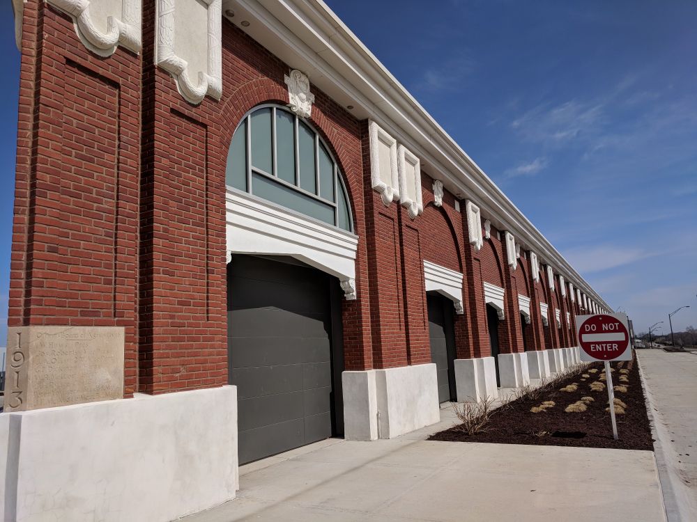 The brick and stone elevation of the 1913 facade of the Food Innovation Center building at the Nebraska Innovation Campus. 