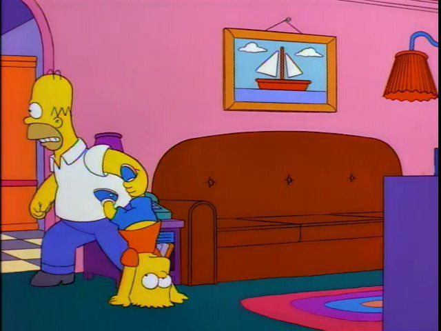 Simpsons house. Homer is shouting to Marge while he is holding Bart by his leg. Bart is upside down.