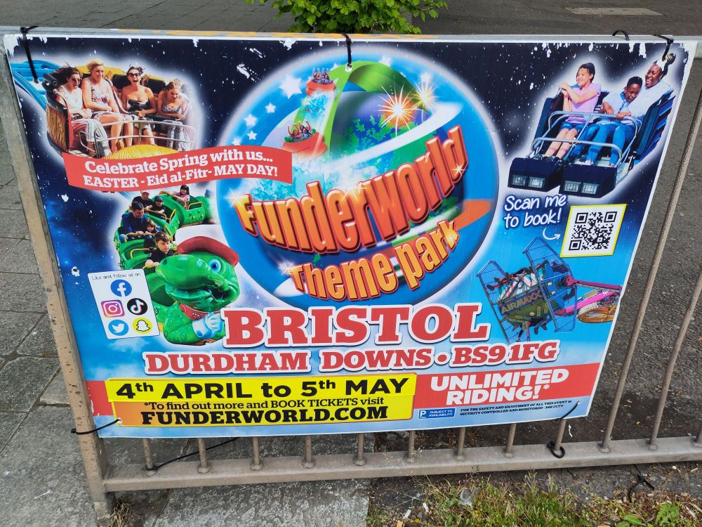 Very busy poster attached to railings. The main text reads "Funderworld theme park, Bristol"