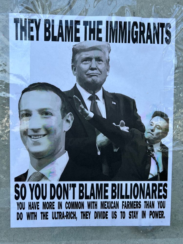 Poster taped to a Palm Beach, FL utility pole that says,

THEY BLAME THE IMMIGRANTS
SO YOU DON'T BLAME BILLIONARES
YOU HAVE MORE IN COMMON WITH MEXICAN FARMERS THAN YOU DO WITH THE ULTRA-RICH, THEY DIVIDE US TO STAY IN POWER.