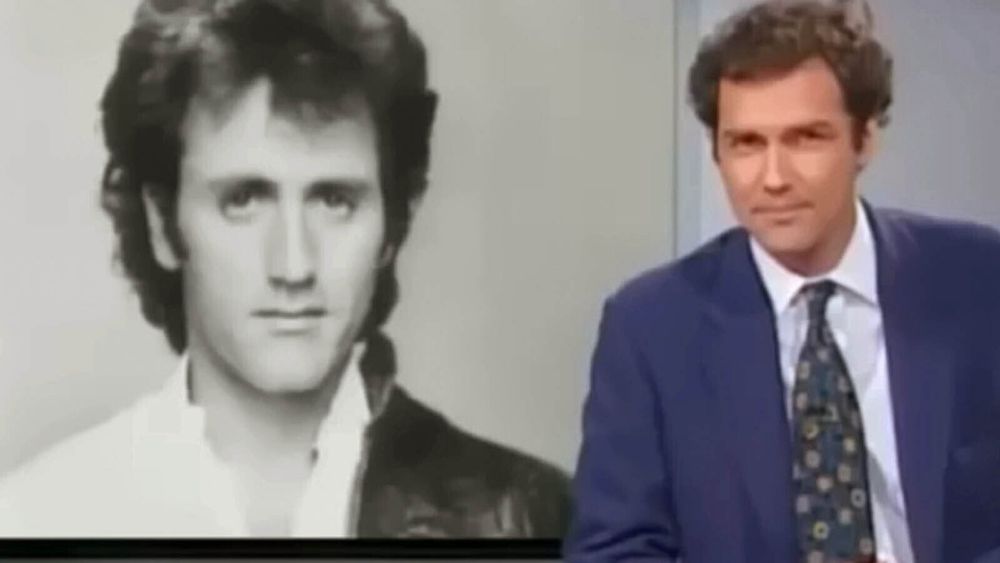 Norm MacDonald on Weekend Update, alongside a picture of… you guessed it, Frank Stallone!
