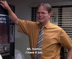 Dwight from The Office saying "Ah, humor. I have it too," while wearing an orange shirt. 