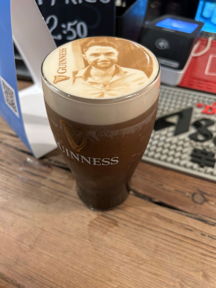 Joel’s face imprinted in Guinness foam