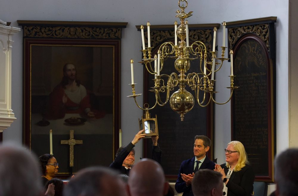 Ken Burns holding award