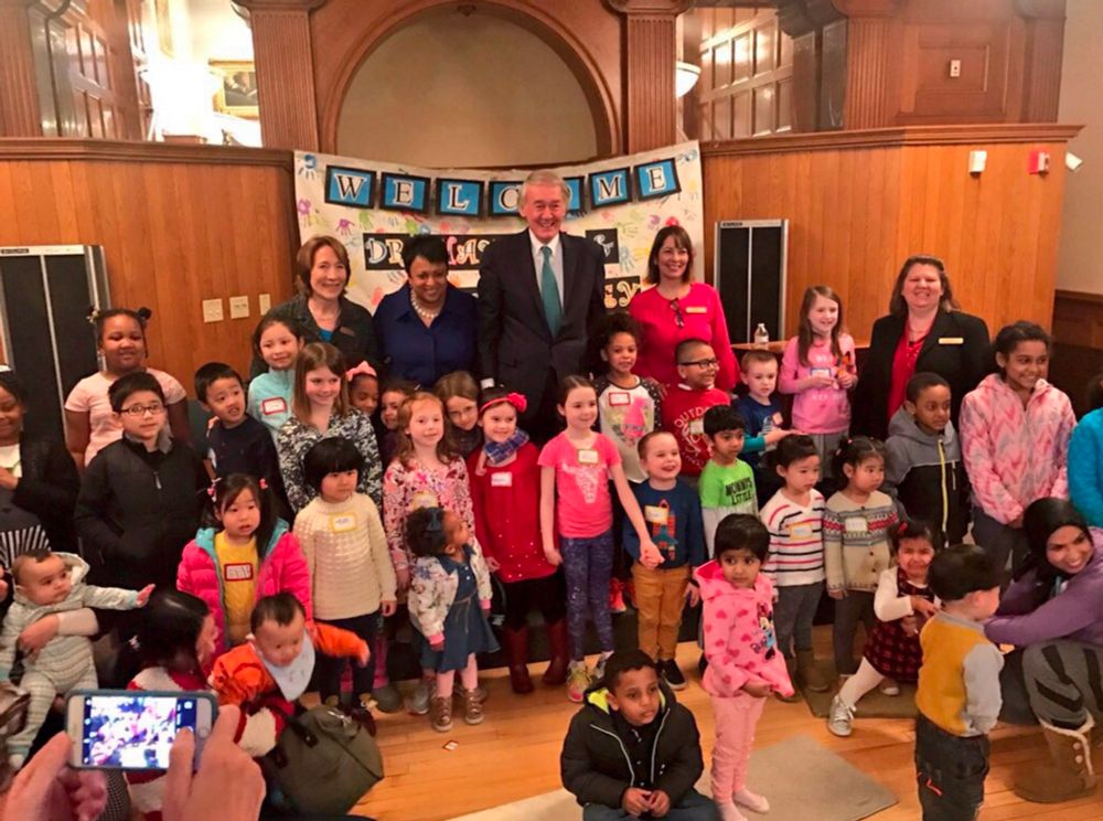 Senator Markey stands with Dr. Carla Hayden and a group of children at the Malden Library