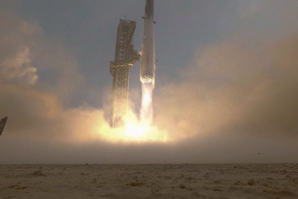 Starship super heavy booster launching from up close
