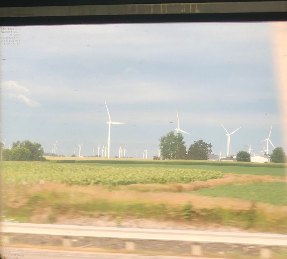 Wind turbine farm. Image taken from an Amtrak train in Indiana.