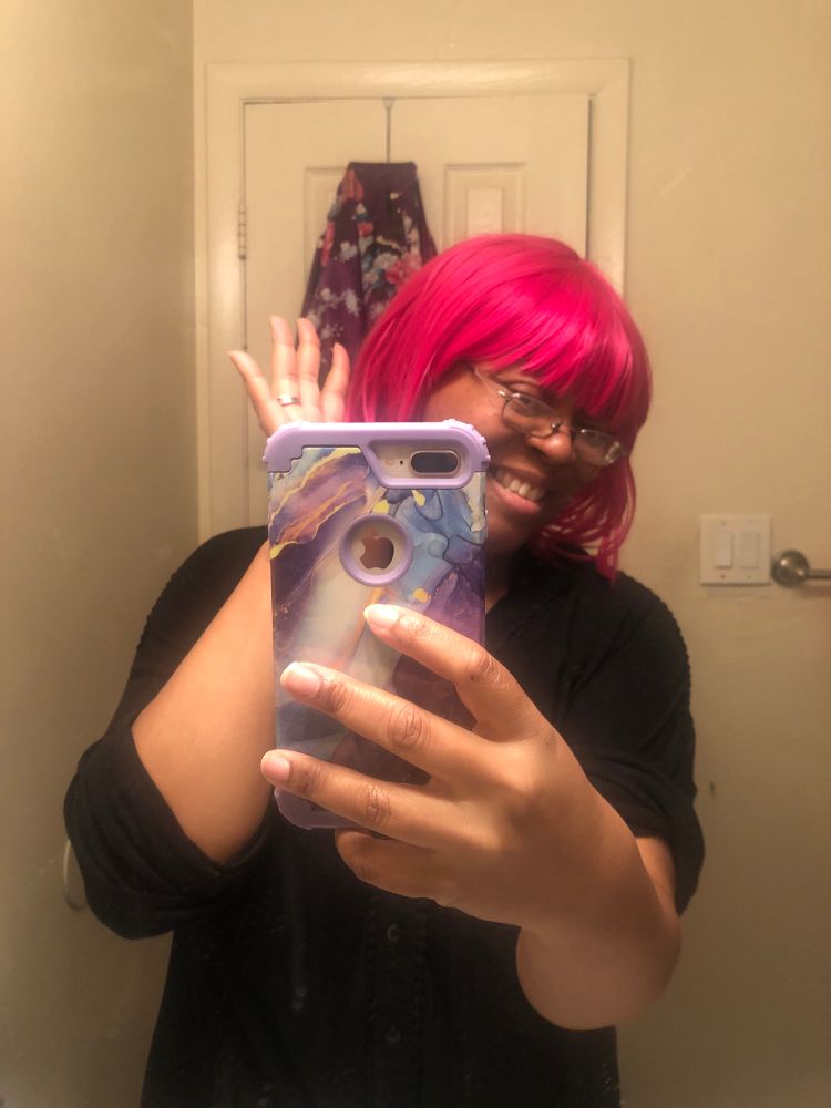 Pink hair purple iPhone case bathroom selfie