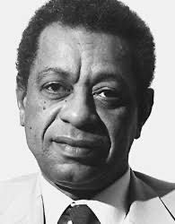 Black and white photo of Tayeb Salih.
