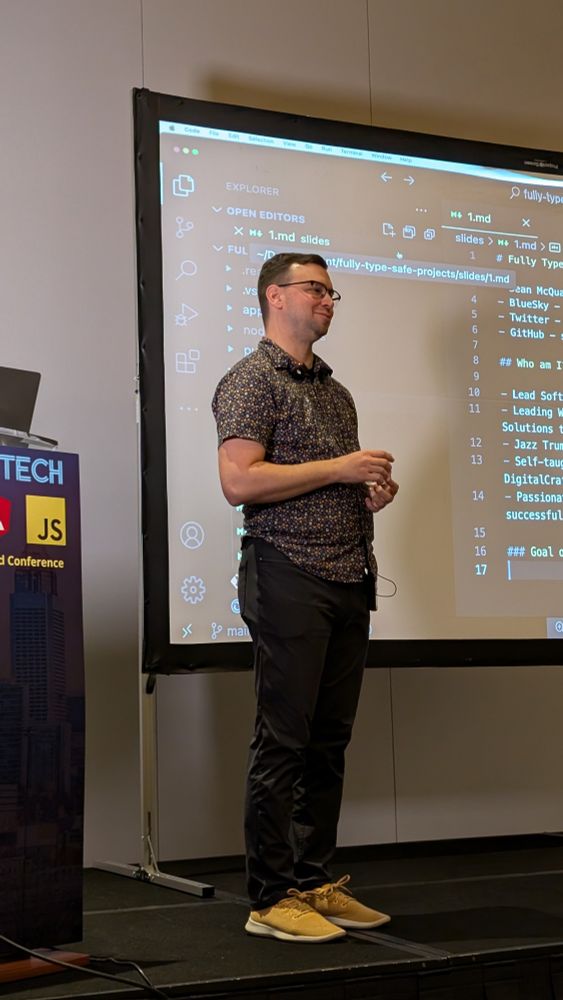 Sean standing on stage presenting about Typescript and Zod