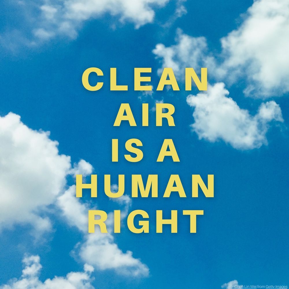 Blue sky with scattered white clouds. Bold yellow text reads: “CLEAN AIR IS A HUMAN RIGHT”.