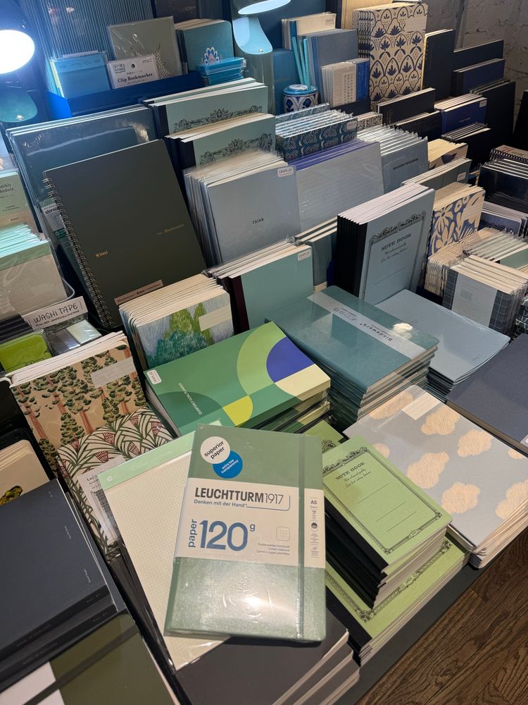 an array of colorful notebooks 