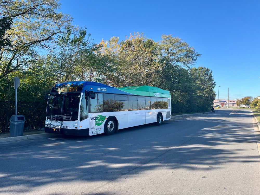 An IndyGo Hybrid bus sits at the recovery point of Route 25, at the Walmart on Lafayette Road. 